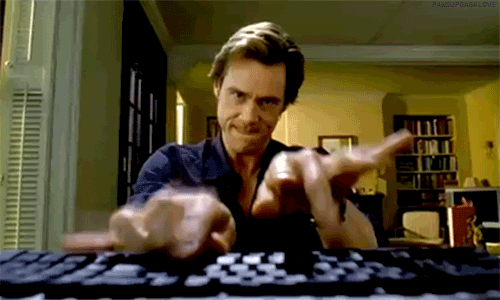 jim carey qui fait du blogging et tape en continu sur le clavier de son ordinateur